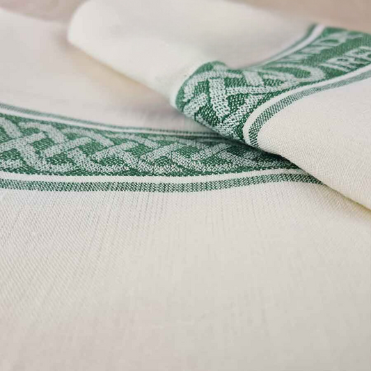 Close up image of Irish Linen Tea Towel with green Celtic boarder design